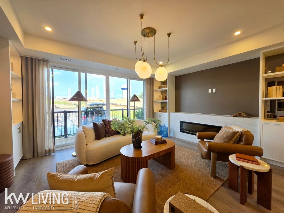 AVELLA model suite living area with fireplace